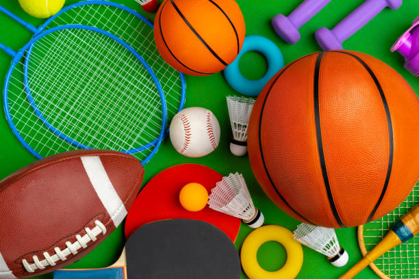 Composition of various sport equipment for fitness and games. Close up